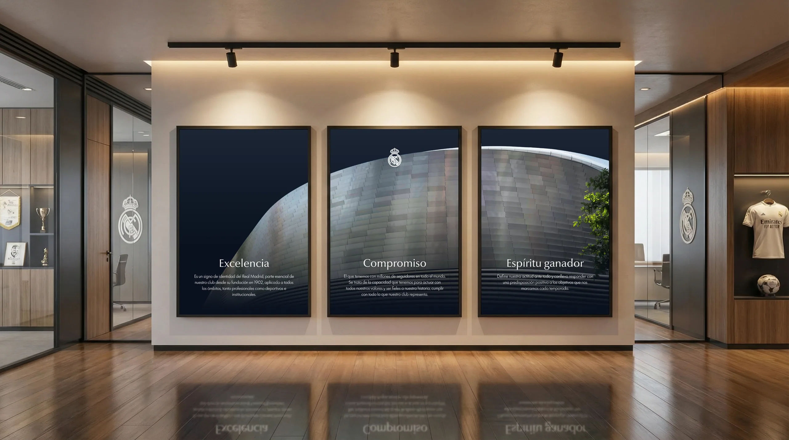 Museum hall displaying three framed Real Madrid identity posters